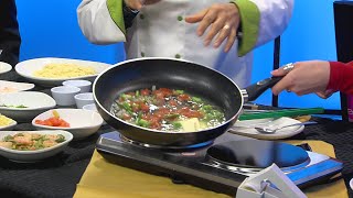 Olive Garden demonstrates how to make shrimp scampi [upl. by Publius]