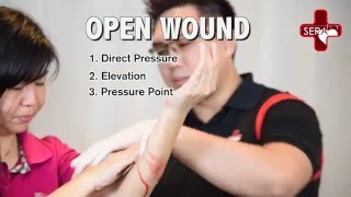 Open Wound  Simple Pressure Bandage  Singapore Emergency Responder Academy [upl. by Ayatahs]