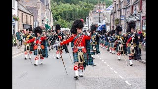 Massed Pipes amp Drums parade through Deeside town to start the Ballater Highland Games 2018 [upl. by Enovad908]