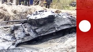 Rare WWII tank emerges from mud in Poland [upl. by Gnim]